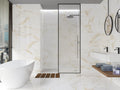 Badeværelse med bruser, vaske, badekar og Marshal Gold marmor fliser på vægge og gulv